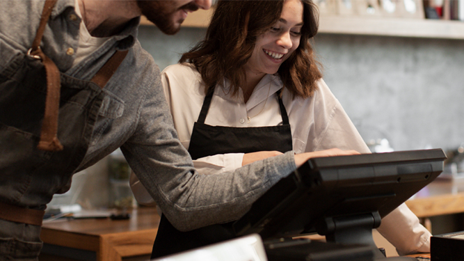 Staff using POS in a Business